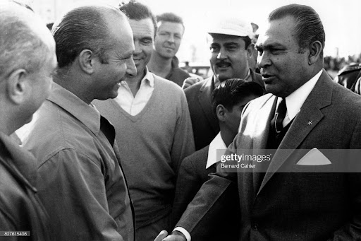 Juan Manuel Fangio and Fulgencio Batista, the U.S.-backed dictator of Cuba, at the Grand Prix of Cuba in La Havana on 23 February 1958Juan Manuel Fangio and Fulgencio Batista, the U.S.-backed dictator of Cuba, at the Grand Prix of Cuba in La Havana on 23 February 1958