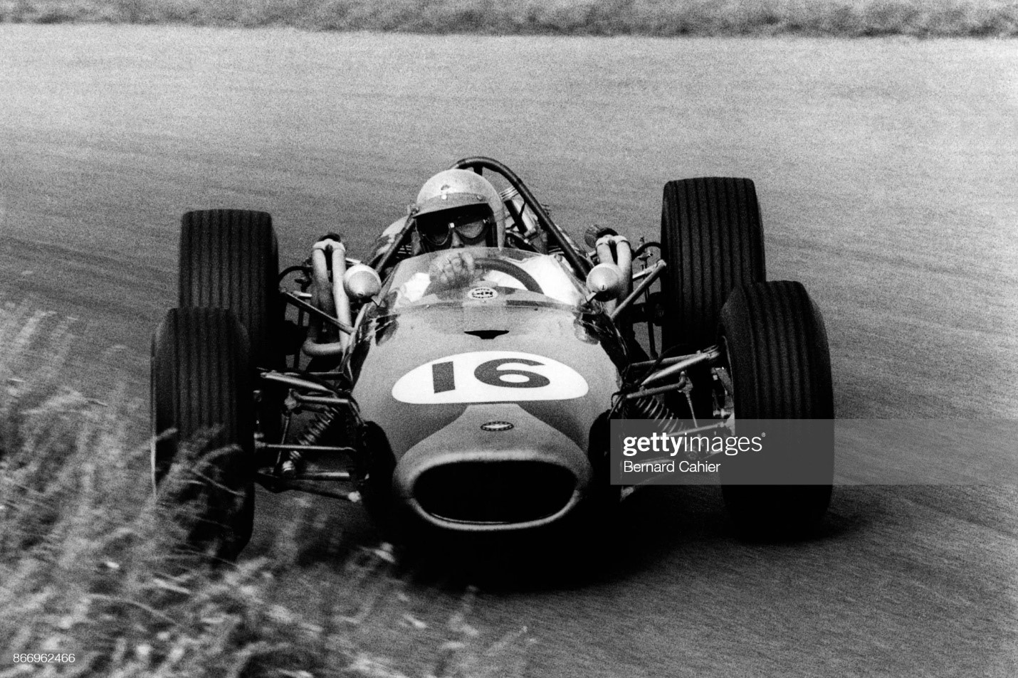 A magnificent four wheel drift for Jack Brabham in the famous Tarzan curve on the Zandvoort circuit during the 1966 Grand Prix of Netherlands.