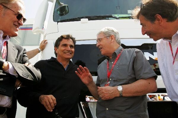 Nelson Piquet (BRA) shares a joke with Mike Doodson (GBR) and the journalist Giuseppe (Pino) Allievi (ITA). Formula One World Championship, Rd 4, Spanish Grand Prix, Practice Day, Barcelona, Spain, Friday 25 April 2008. Photo by Motorsport Images.