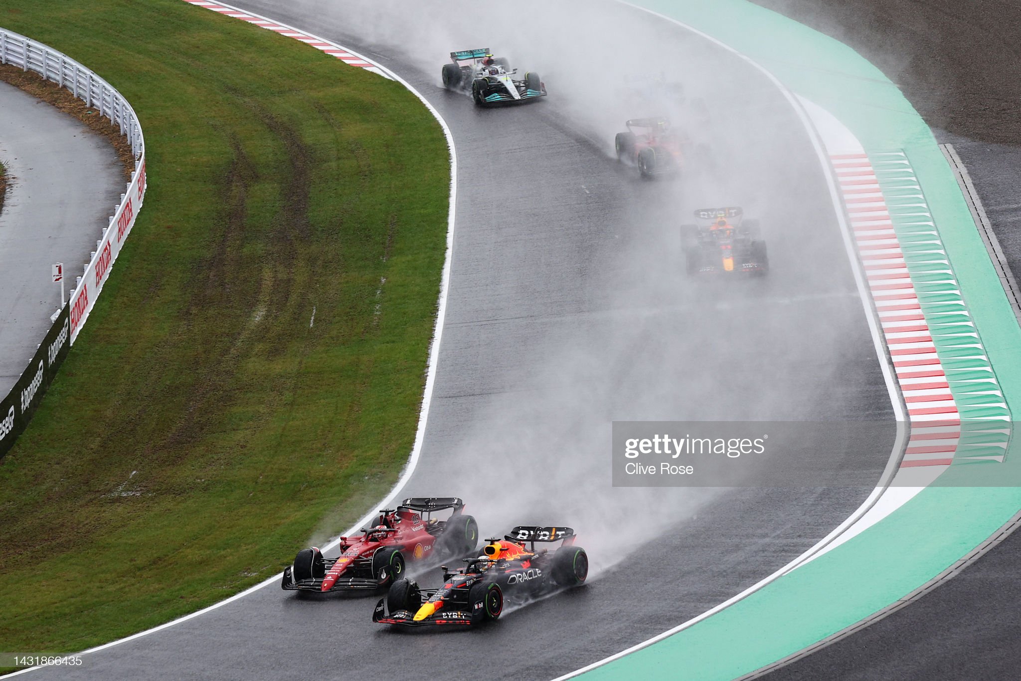Max Verstappen fighting with Charles Leclerc.