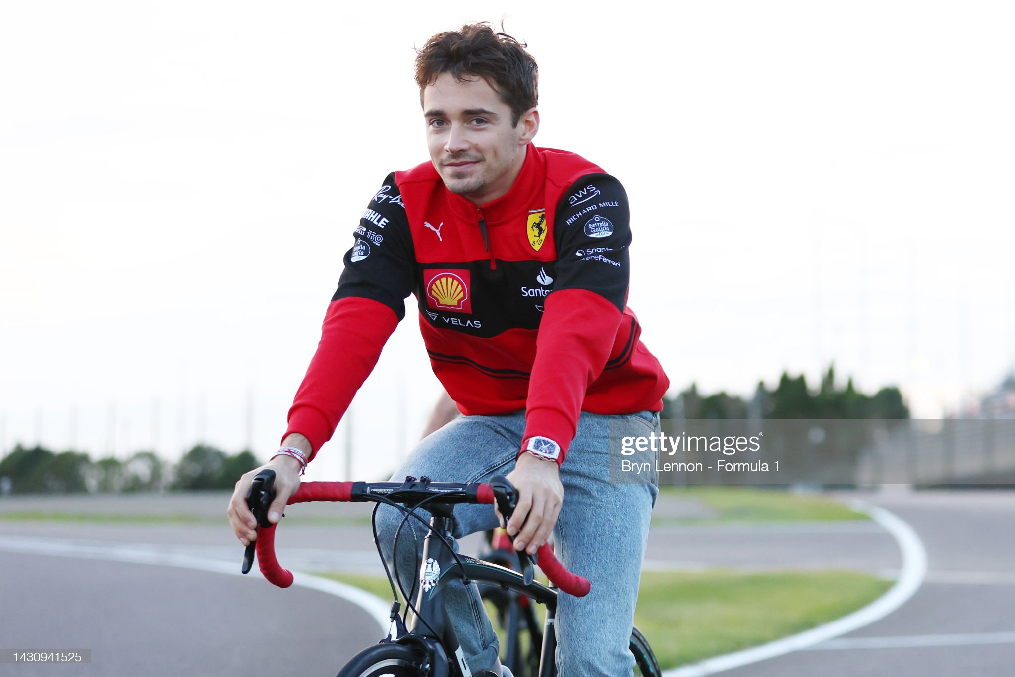 Charles Leclerc on a bicycle.
