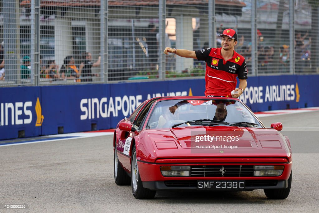 Charles Leclerc, Ferrari, waves to the crowd on the drivers’ parade.