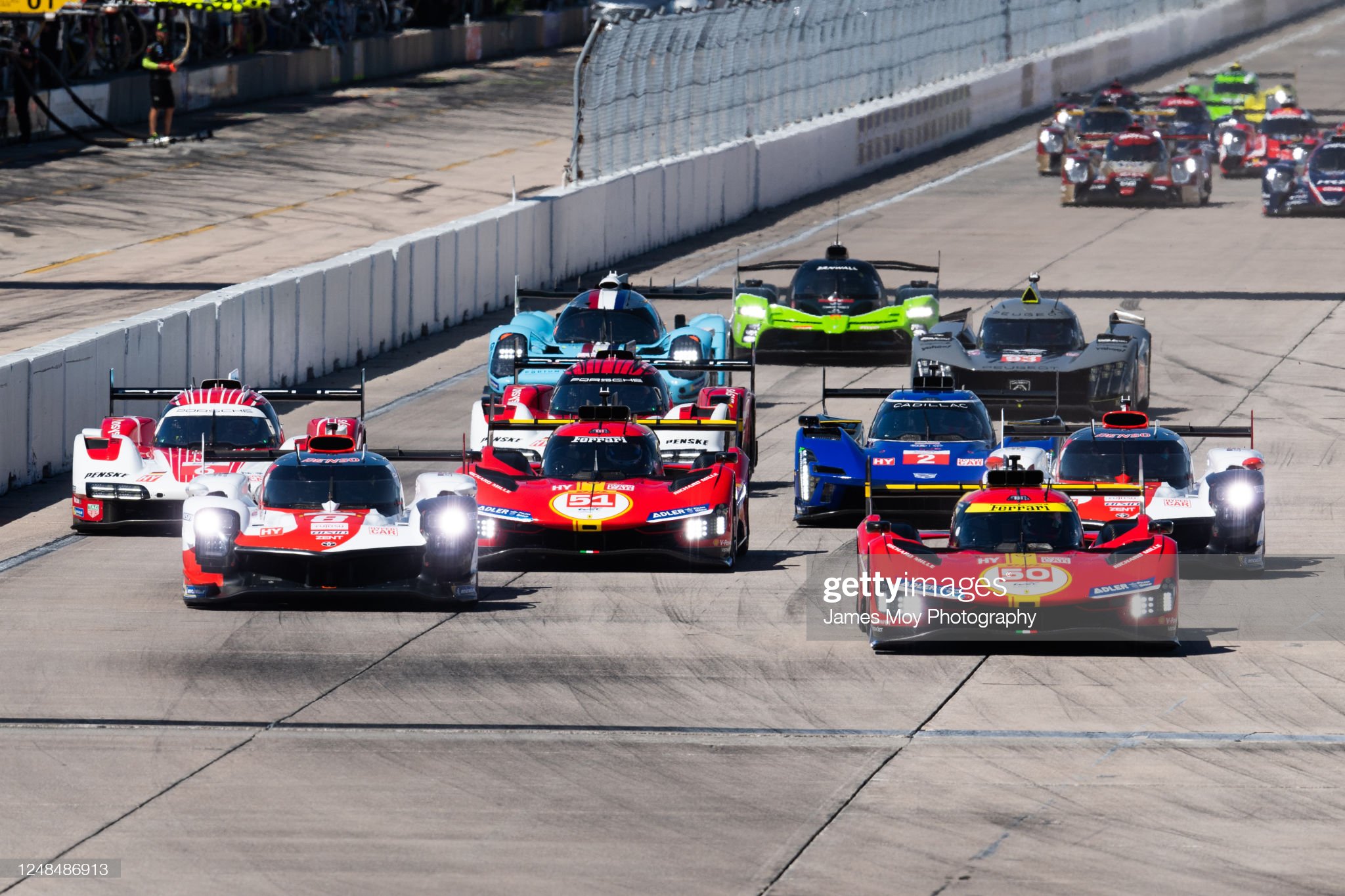 The #50 Ferrari AF Corse, Ferrari 499P of Antonio Fuoco, Miguel Molina and Nicklas Nielsen leads at the start of the 1000 Miles of Sebring at the Sebring International Raceway on March 17, 2023 in Sebring, Florida.