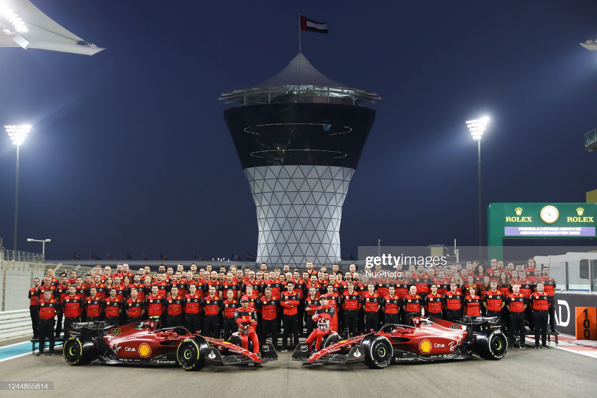 Ferrari team pose for a photo.