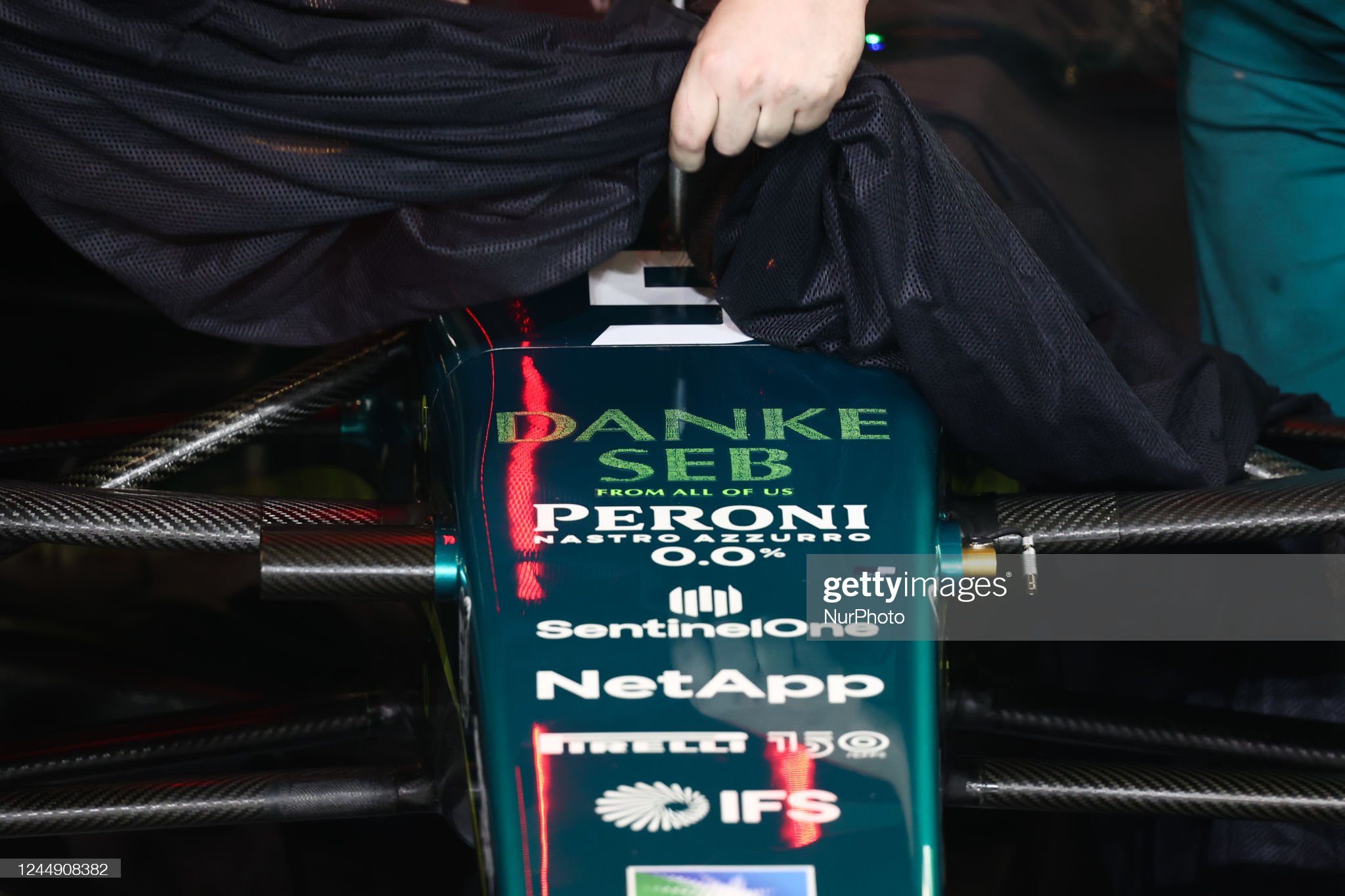 'Danke Seb' sign is seen on the Aston Martin of Sebastian Vettel.