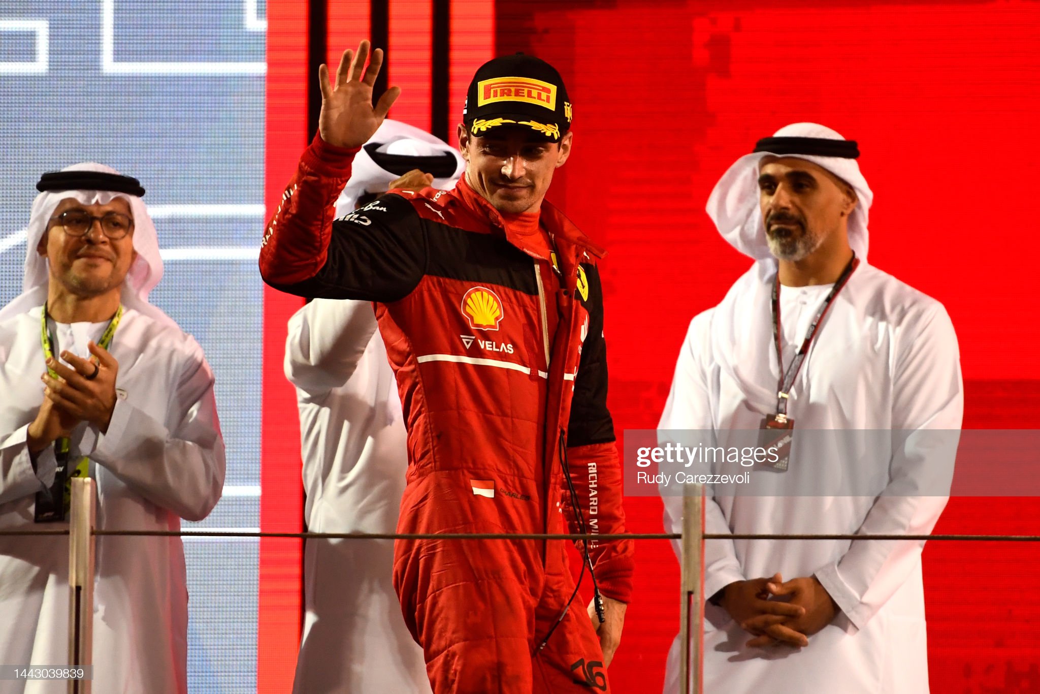 Second placed Charles Leclerc of Monaco and Ferrari celebrates on the podium.