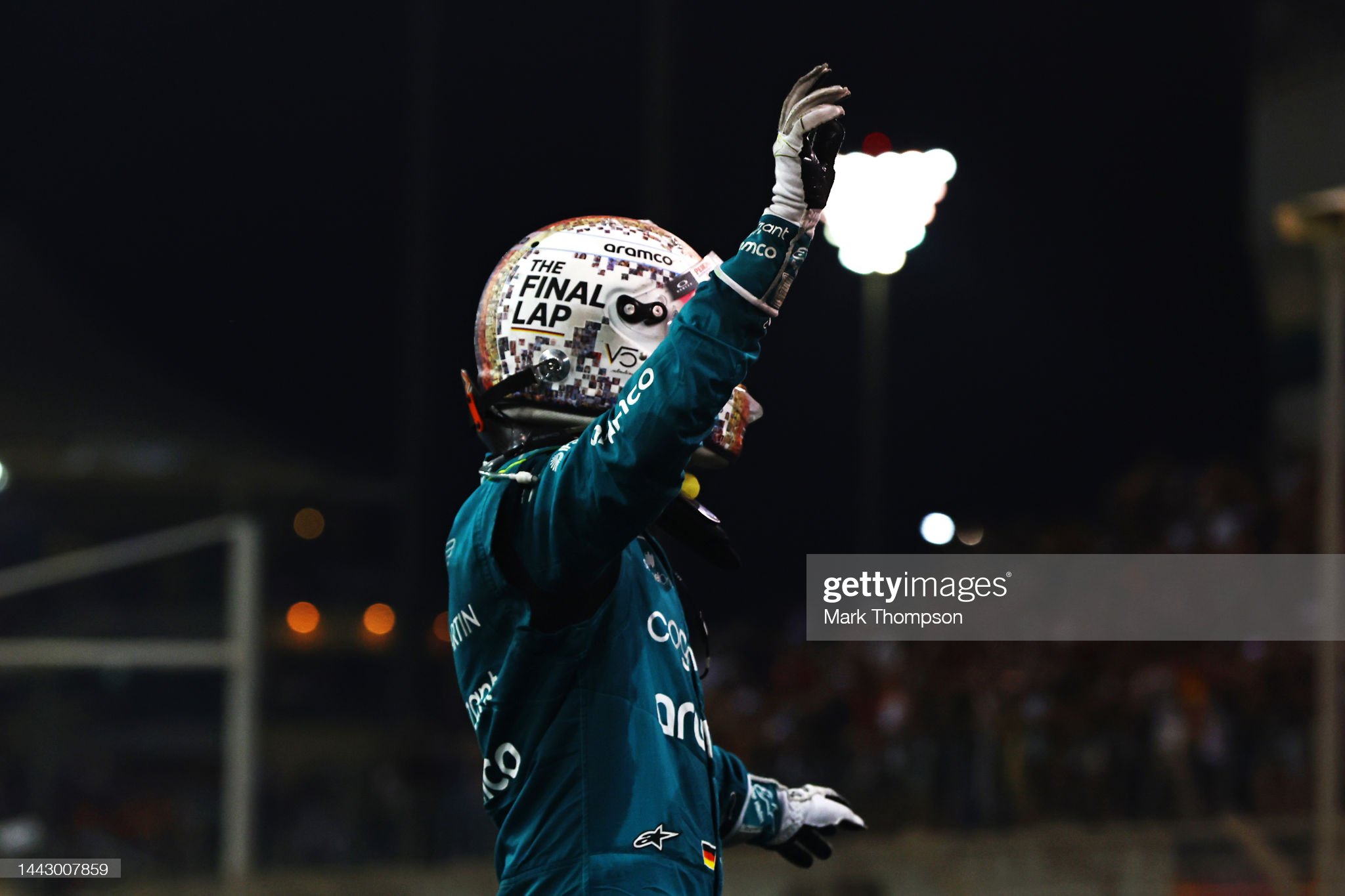 Tenth placed Sebastian Vettel of Germany and Aston Martin F1 Team waves to the crowd following his final race in F1.