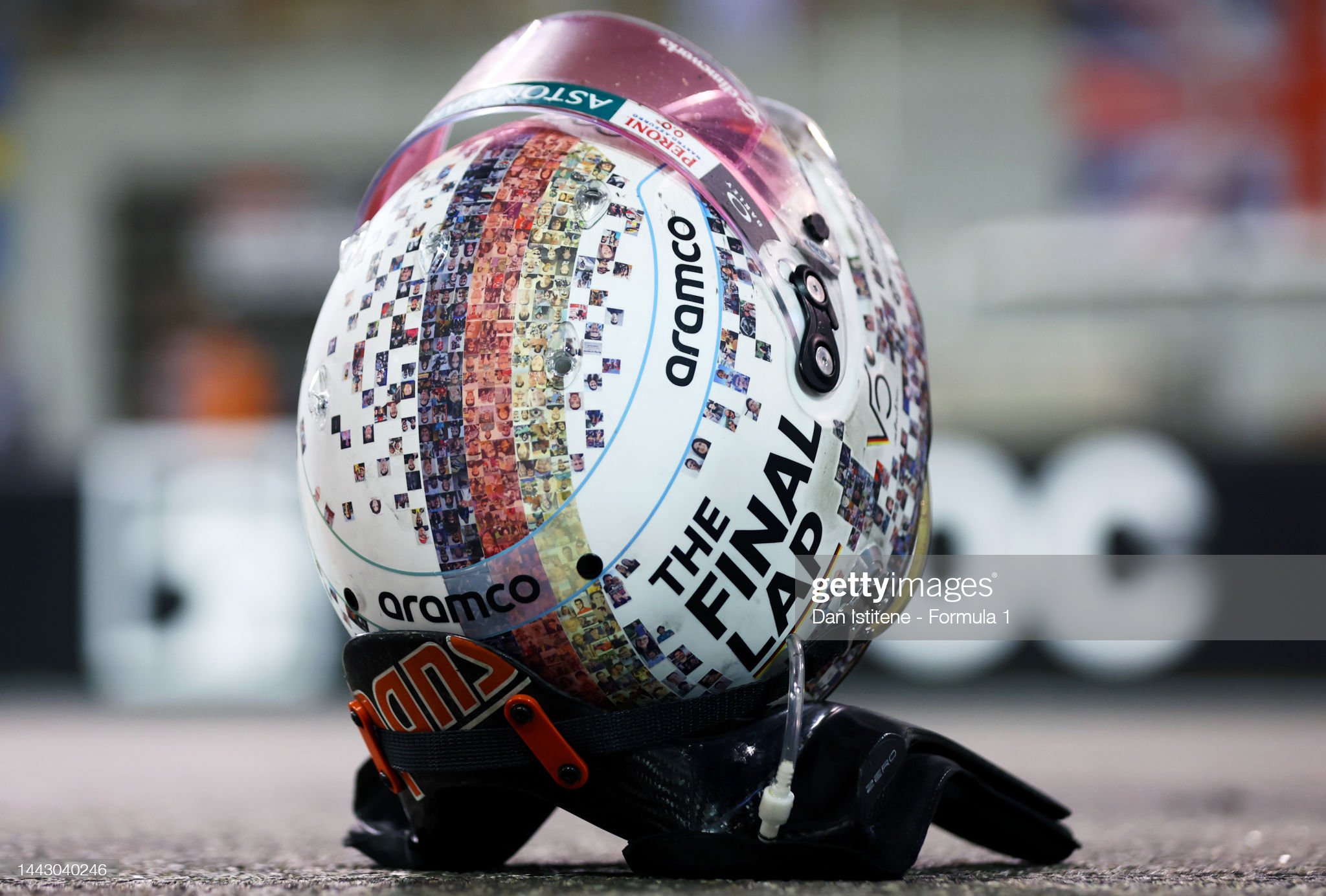 Tenth placed Sebastian Vettel of Germany and Aston Martin F1 Team's race helmet rests on the track following his final race in F1.