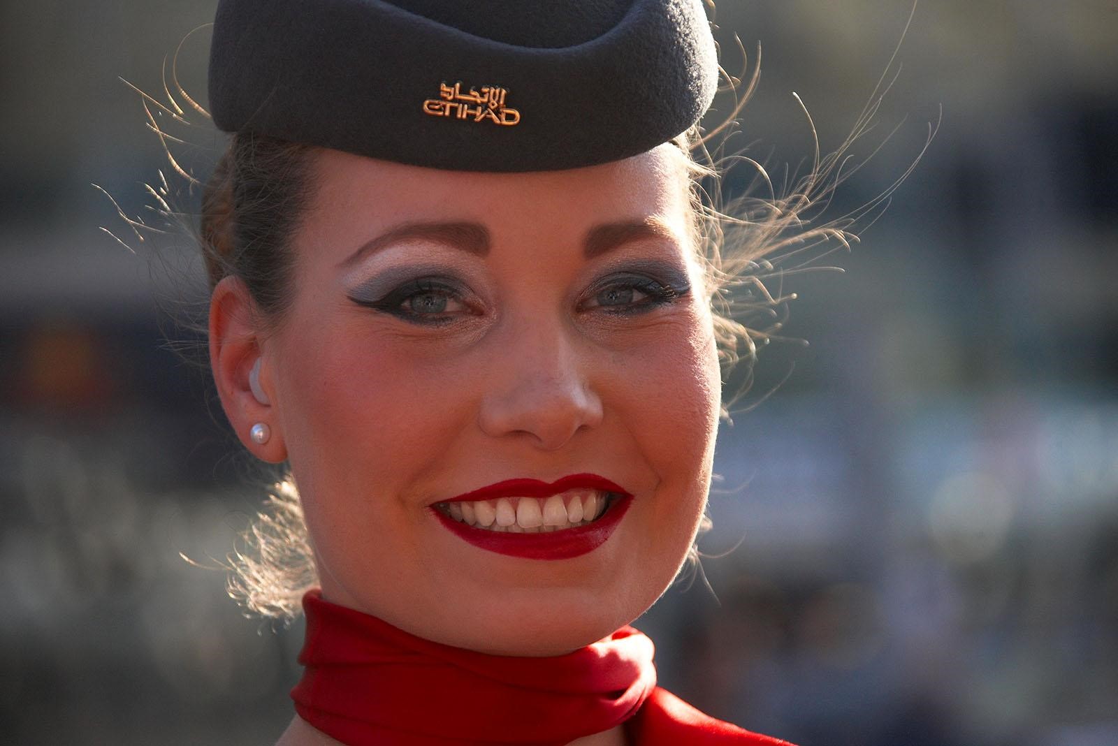 A perfectly made up stewardess of the main sponsor Etihad Airlines at Abu Dhabi in 2011. 