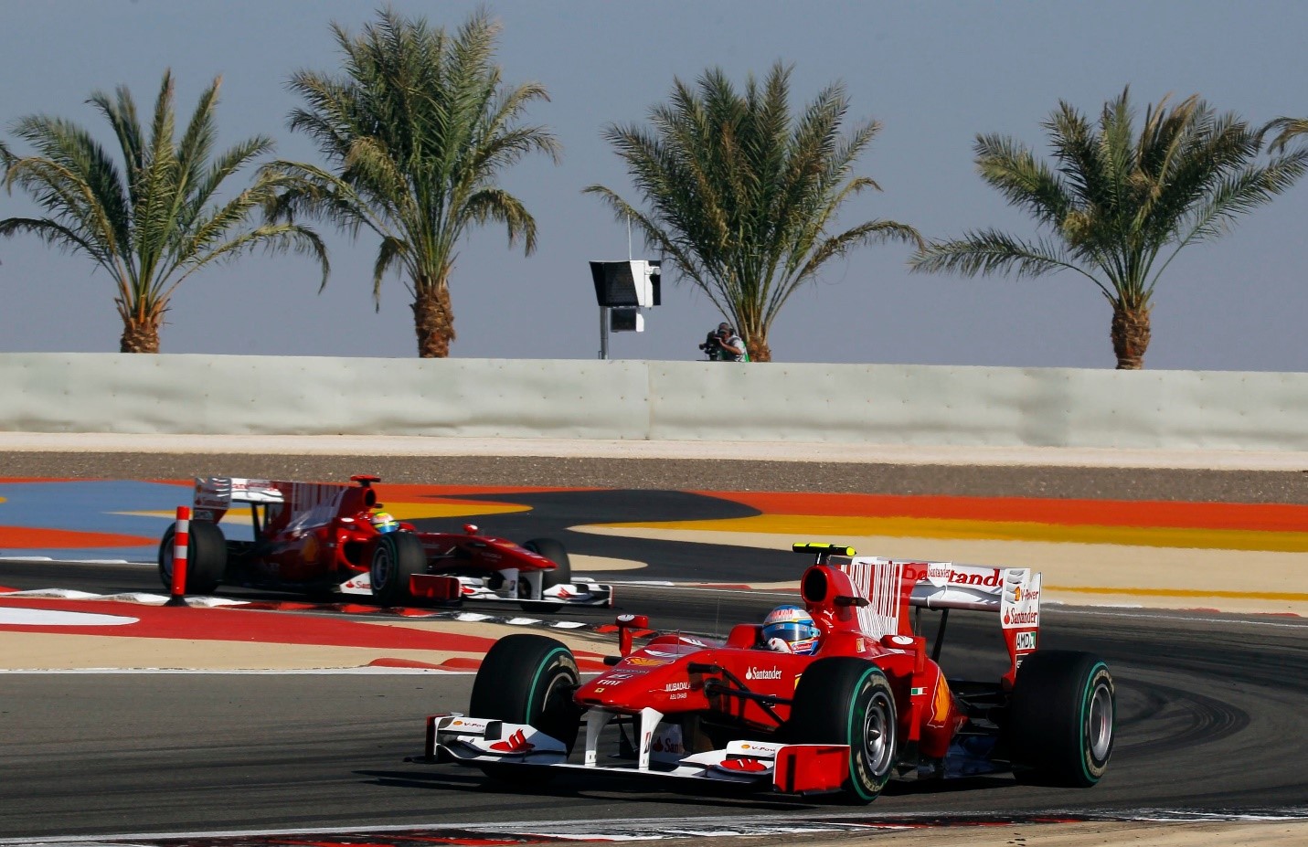 Fernando Alonso leads teammate Felipe Massa during the Bahrain Grand Prix at Sakhir circuit in Manama on March 14, 2010. 