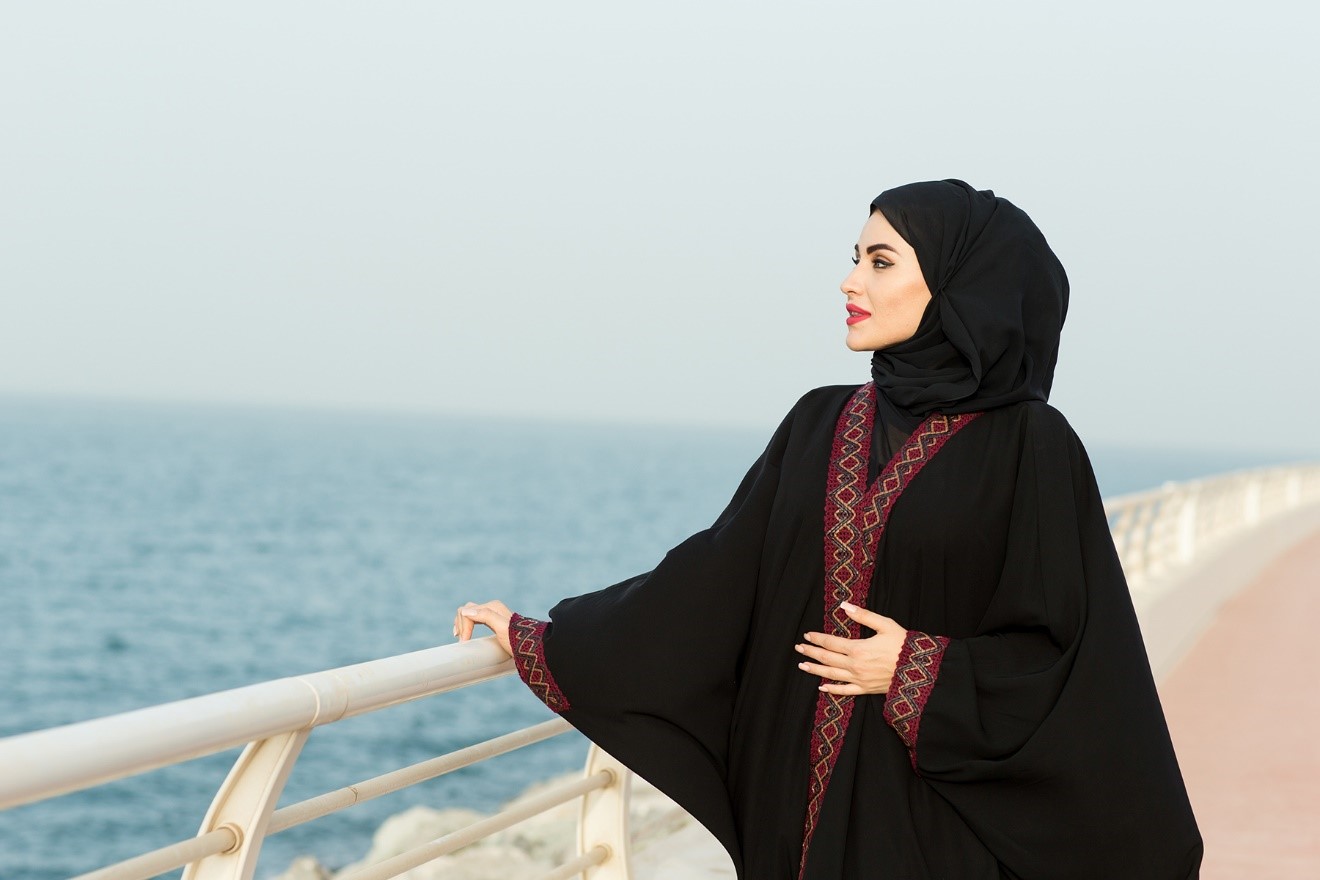 Qatari Arab woman wearing an abaya.