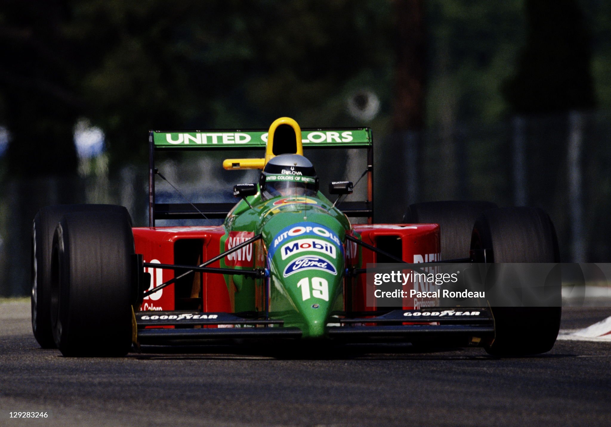 Alessandro Nannini drives the #19 Benetton Formula Benetton B190 Ford HB 3.5 V8 during the San Marino Grand Prix on 13th May 1990 at the Autodromo Enzo e Dino Ferrari in Imola, San Marino.