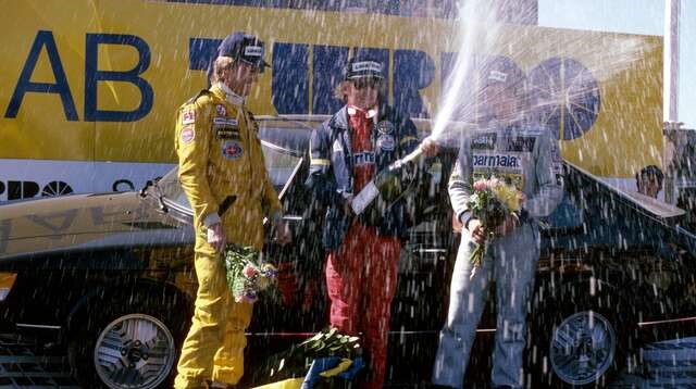 1978 winner Niki Lauda sprays champagne with Ronnie Peterson and Riccardo Patrese. 
