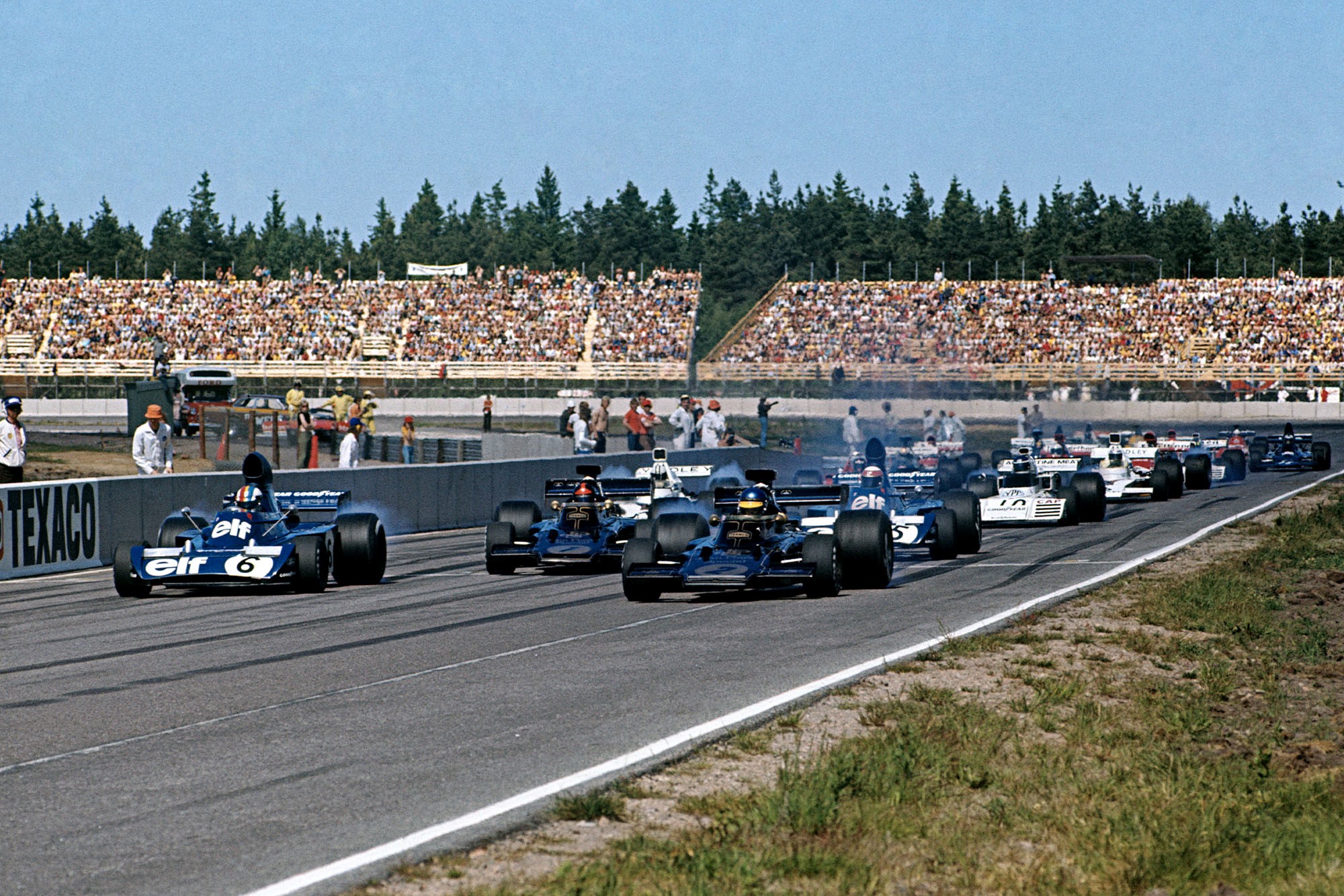 Anderstorp 1973 Swedish Grand Prix. The cars pull away at the start of the race. 
