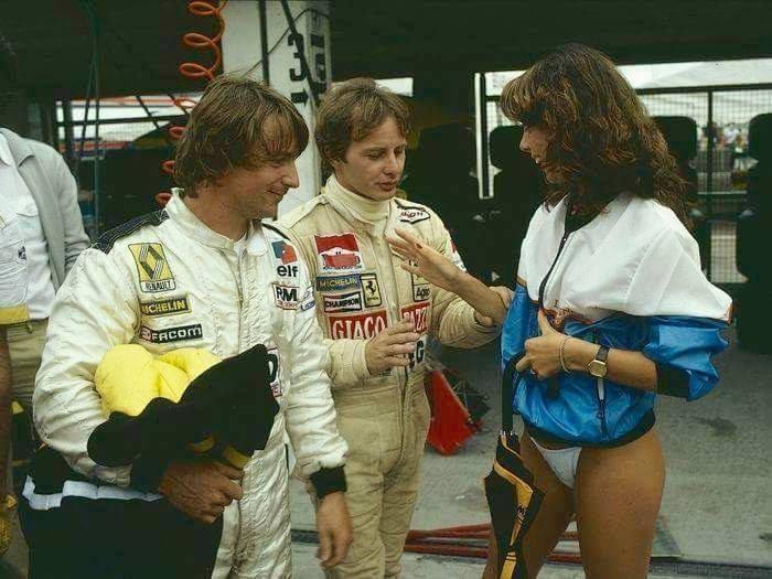 Rene' Arnoux, Gilles Villeneuve and a girl.