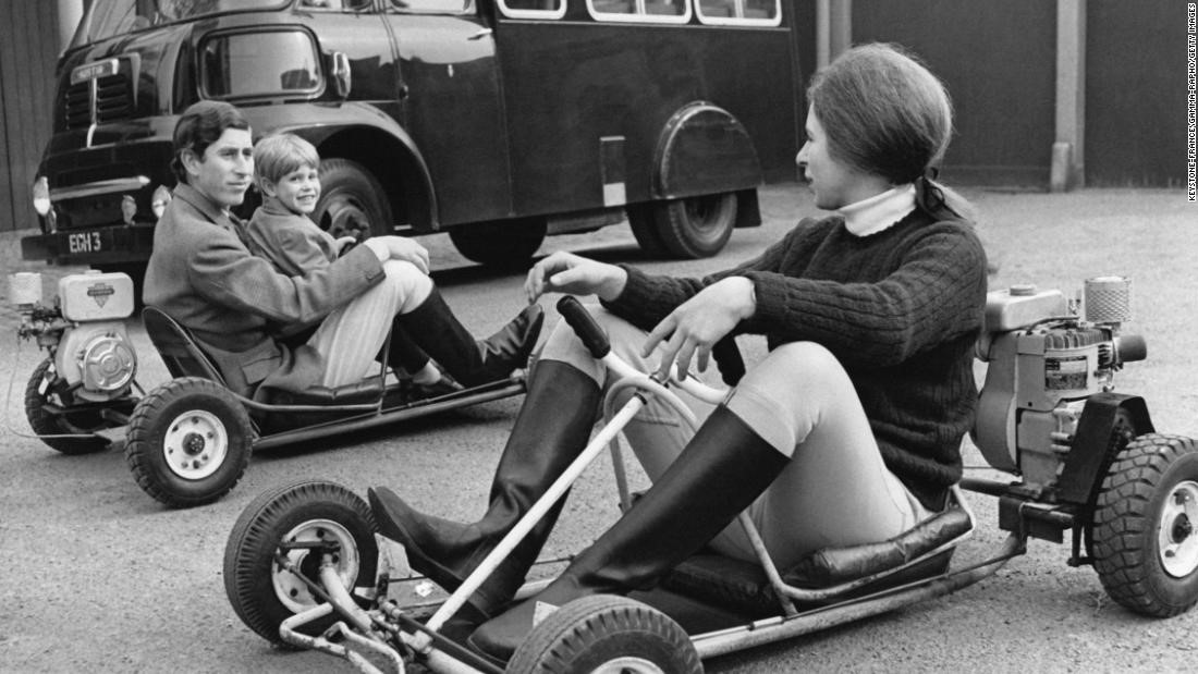 London, UK. 10th Apr, 1969. Prince Charles riding a go-kart with younger brother Prince Edward, on Windsor Castle grounds. Princess Anne is riding a kart in the foreground. 