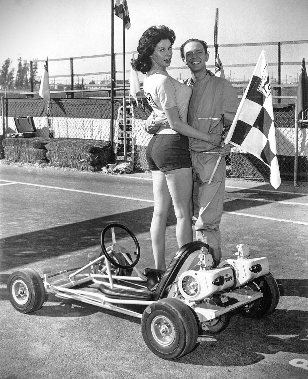 Don Knotts with the trophy girl in victory lane.