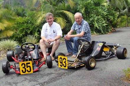 Two of the world’s most iconic men in the sport of karting, Harm Schuurman (left) and Angelo Parrilla (right) with two of Graham Powles' restored karts.