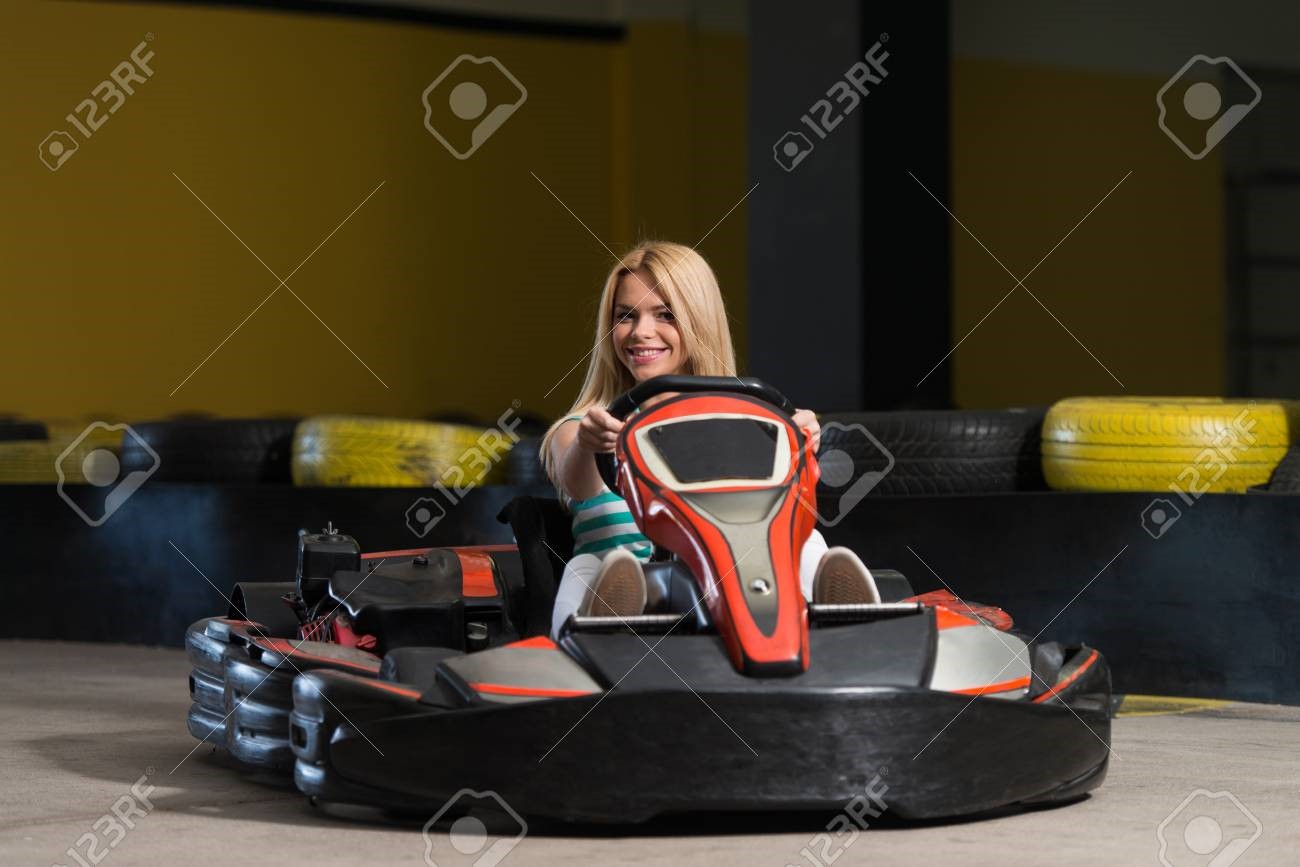 Girl on a go-kart.