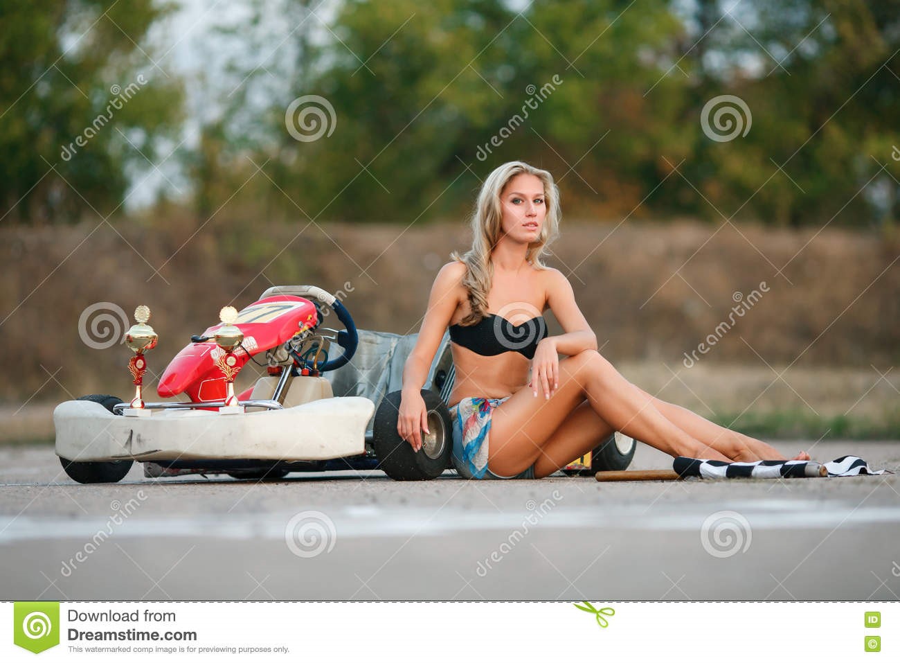 Sexy blonde girl and a go-kart.