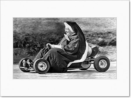 Akron, Ohio, October 10, 1962. Sister John Bosco of the St. Sebastian School in Akron having fun tooling around a go-kart track.