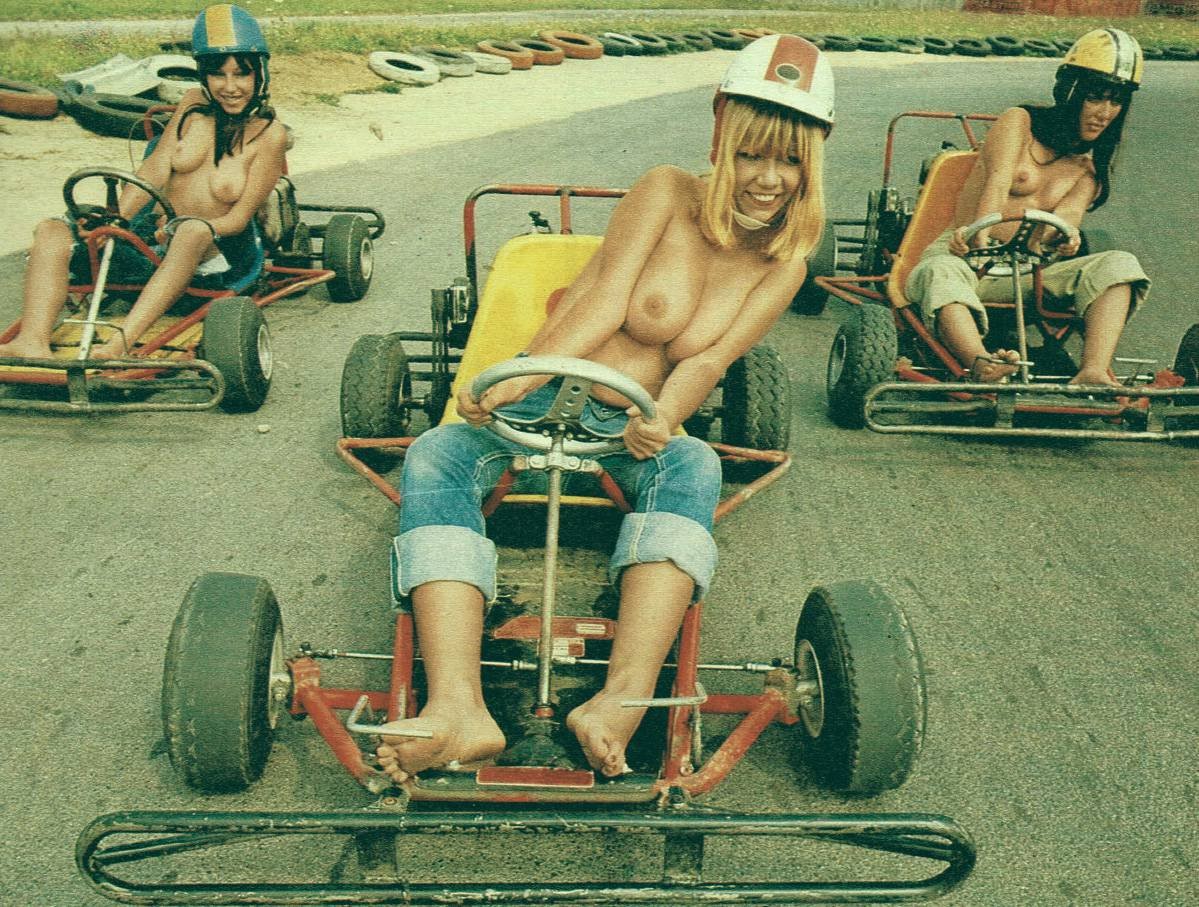 Topless girls in karts.