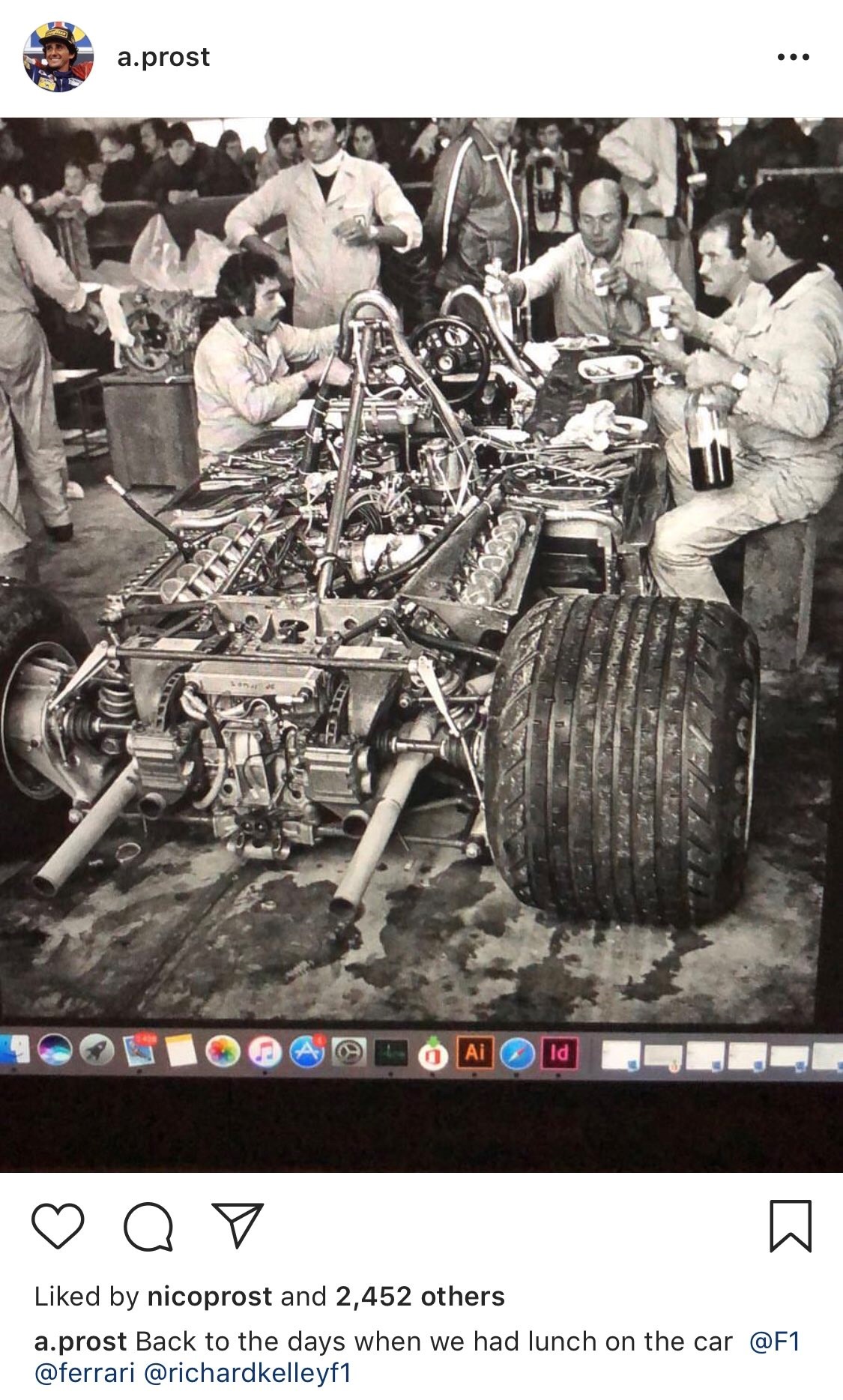The flanks of the Ferrari 312 T2 serve as a table for the Scuderia Ferrari mechanics’ traditional pasta and Lambrusco dinner as they pause to eat during a long-night’s preparation of the car for the 1977 United States Grand Prix. 