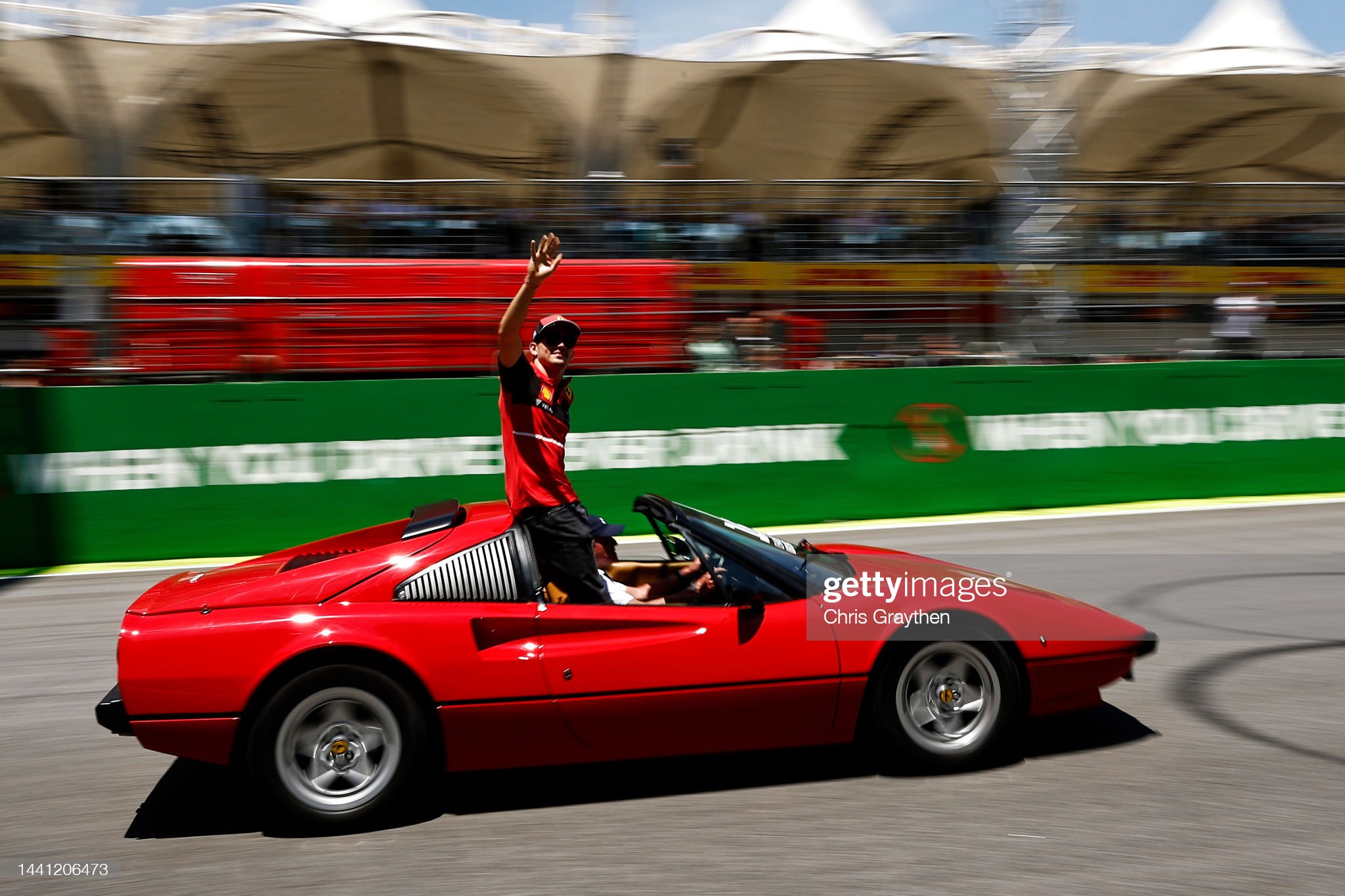Charles Leclerc of Monaco and Ferrari waves to the crowd on the drivers’ parade prior to the F1 Grand Prix of Brazil.