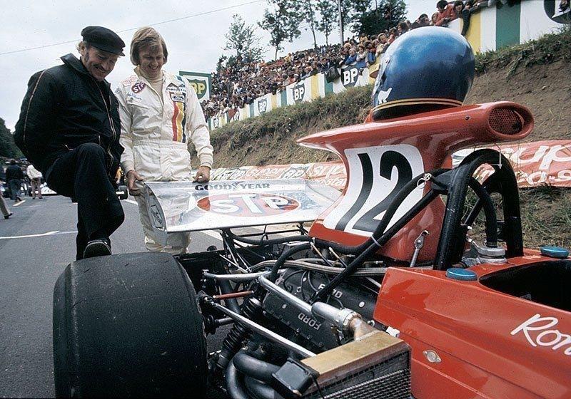 Colin Chapman with Ronnie Peterson, March.