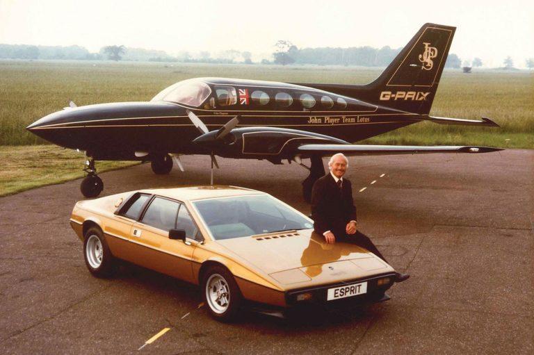 Lotus Founder and designer Colin Chapman with his Lotus Esprit and liveried personal plane.