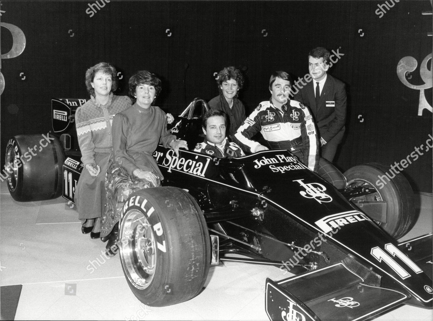 1983 John Player Special Lotus 93T. In the car Elio De Angelis with n.2 driver Nigel Mansell, Hazel Chapman and 2 daughters and son.