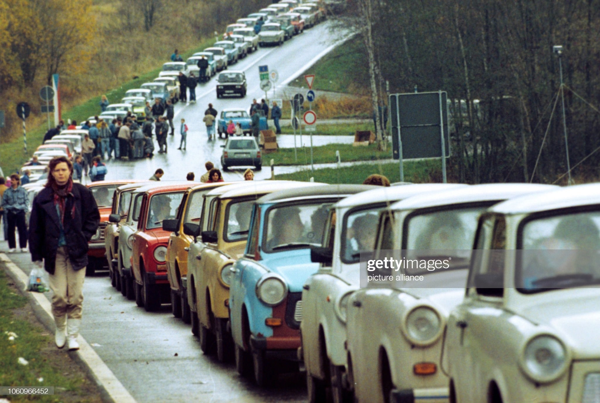 A sheer endless column of cars from the GDR, mostly Trabis and Ladas, has formed in front of the border crossing point between the former CSSR and Western Germany / Bavaria in Schirnding, November 5th 1989.