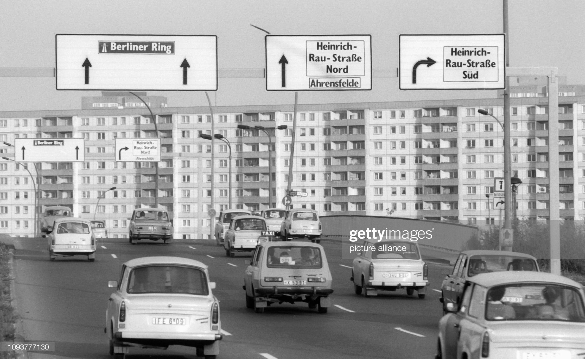 Vehicles of the ‘Trabant’ and ‘Wartburg’ type cross the Marzahner Bridge in Berlin, in April 1987.
