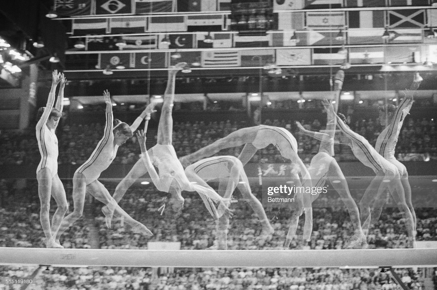 Montreal: multiple exposure show's Romania's Nadia Comaneci on the balance beam in Olympic women gymnastics 7/22, as she went on to win her second gold medal of the night and her third of the games. 