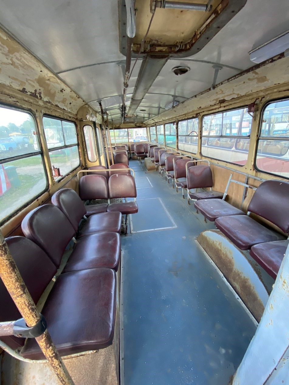The interior of a vintage trolleybus.