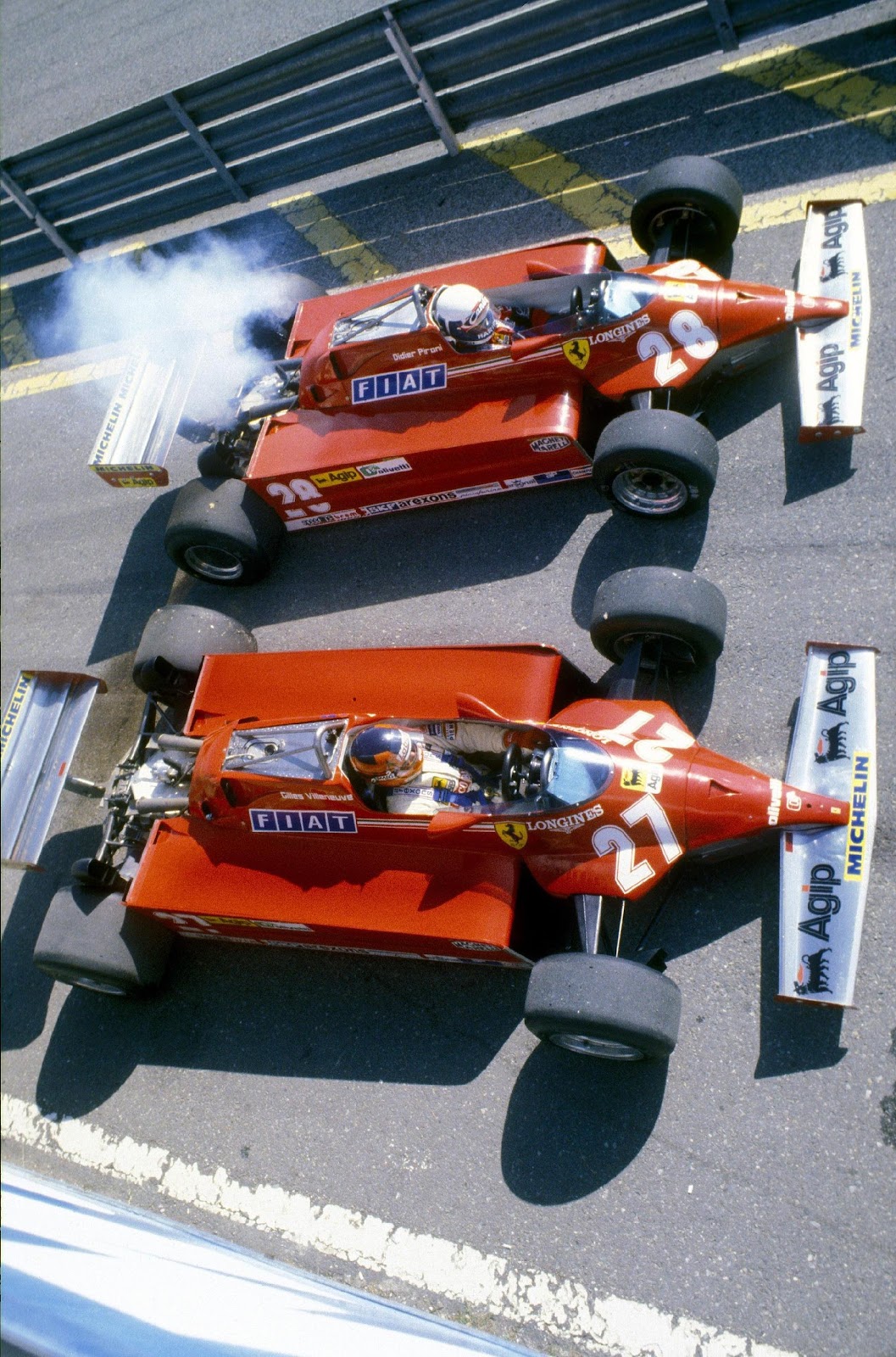 Didier Pironi and Gilles Villeneuve in their Ferraris.
