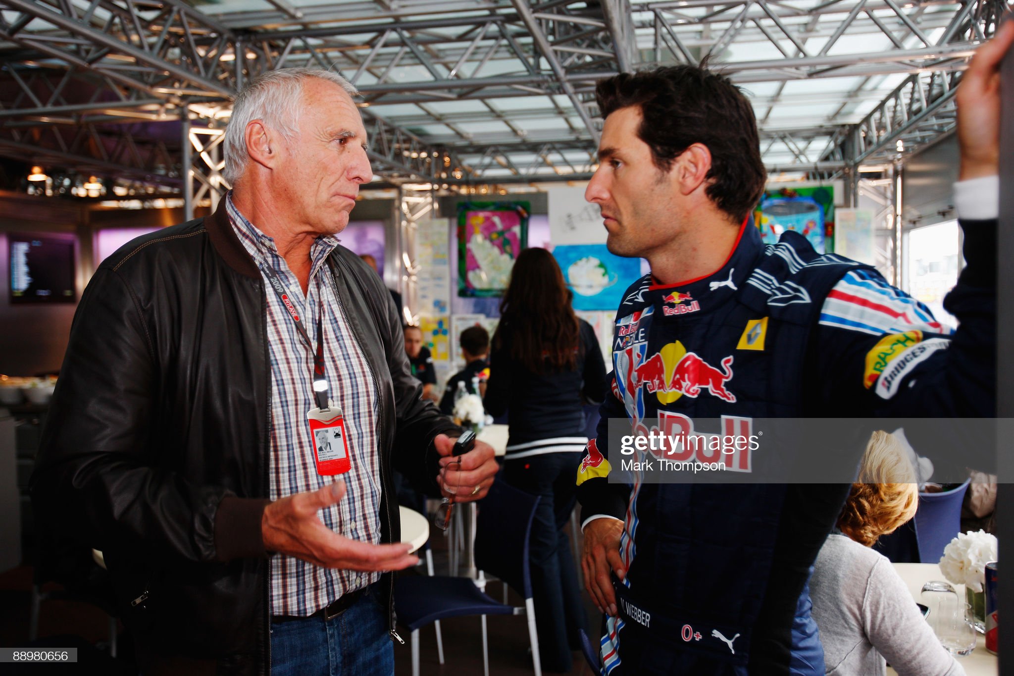 Mark Webber of Australia and Red Bull Racing talks with Red Bull owner Dietrich Mateschitz.