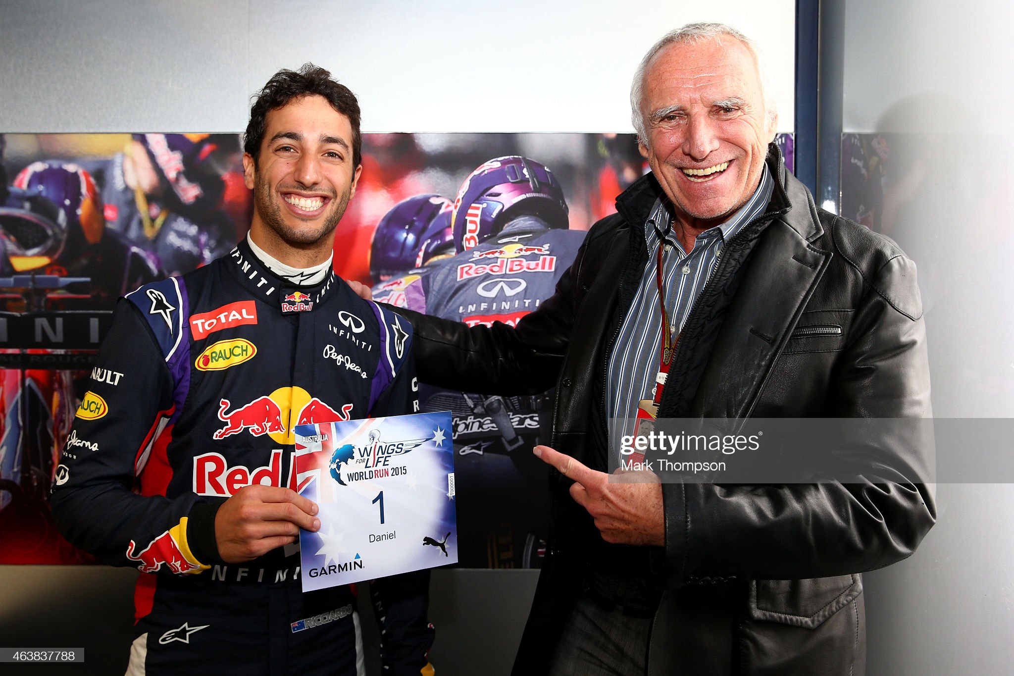 Red Bull Racing's driver Daniel Ricciardo of Australia receiving bib number 1 for the ‘Wings of Live World Run’ from team owner, CEO of the Austria energy drink producer Red Bull and founder of ‘Wings for Life’, a non profit spinal cord research foundation, Dietrich Mateschitz.