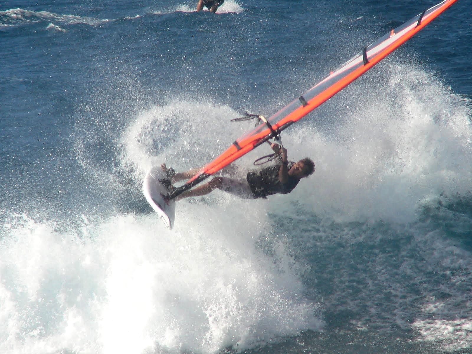 Andrea de Cesaris windsurfing.