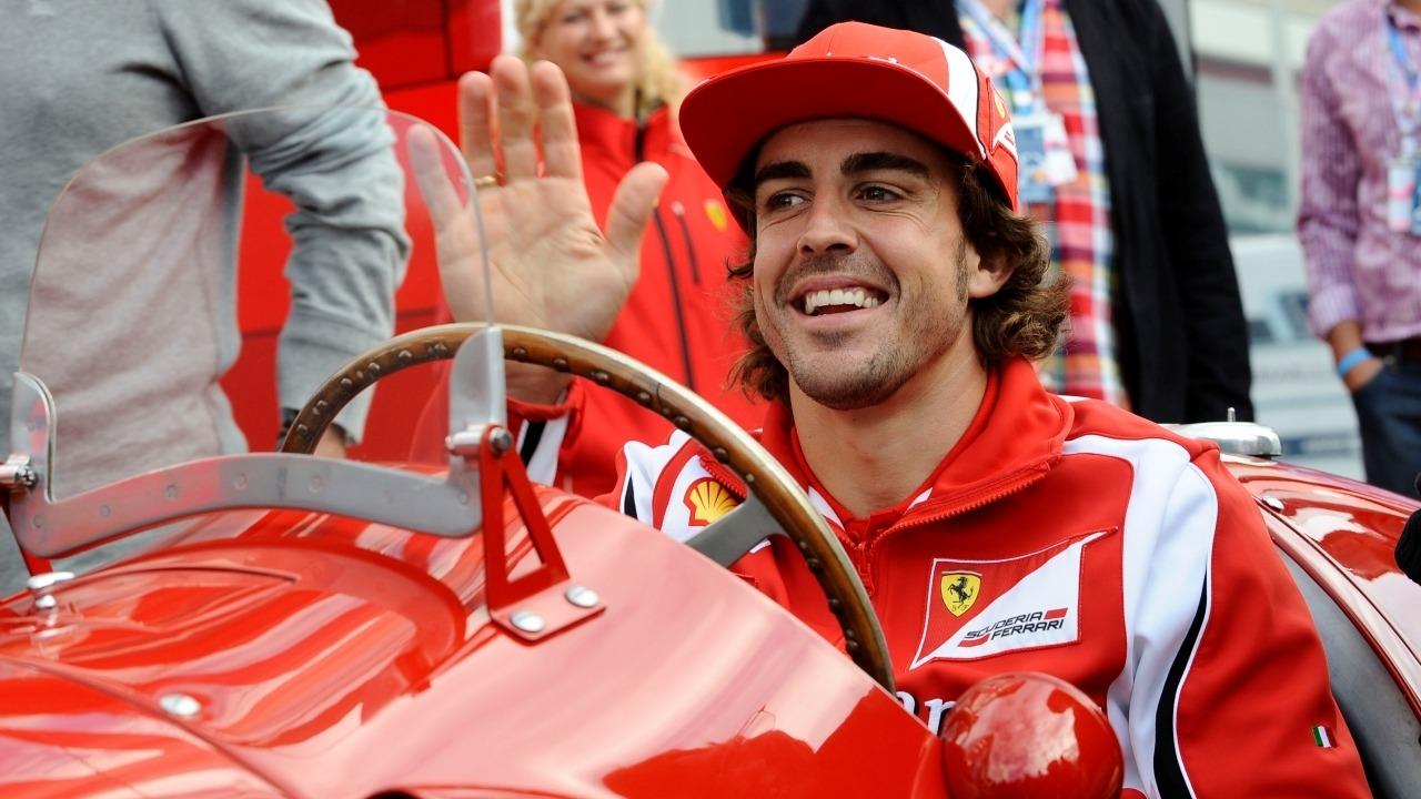 Fernando Alonso, climbed into the Ferrari 375 before putting on his overalls.