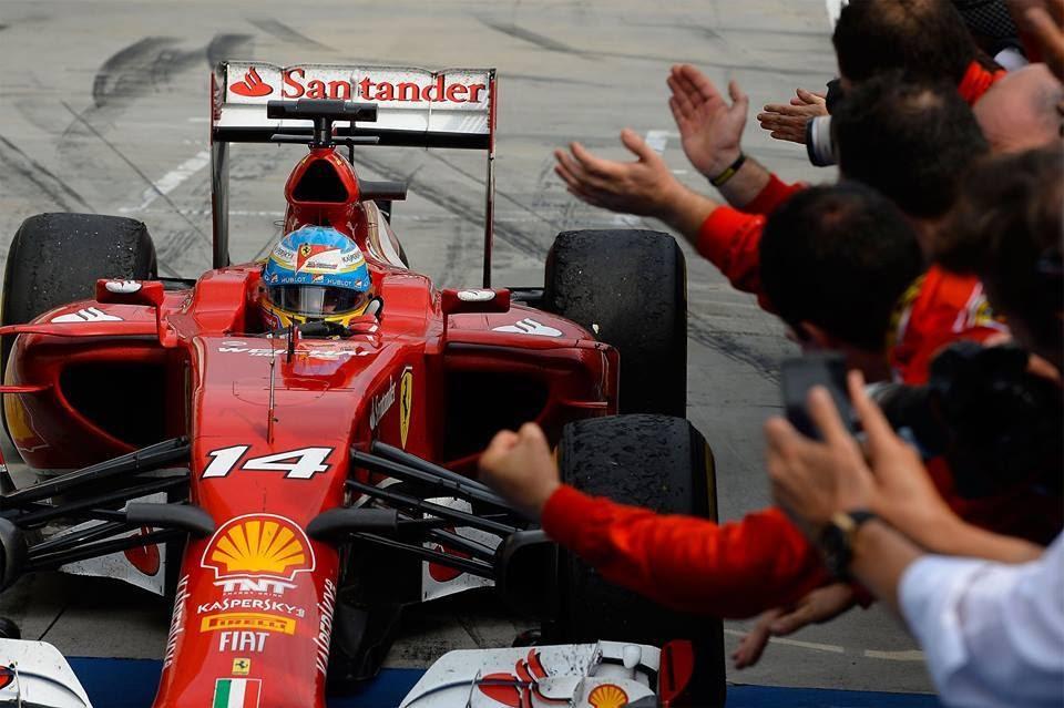 Fernando Alonso in a Ferrari.