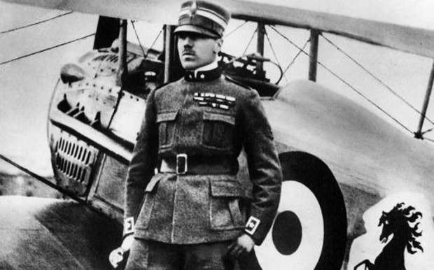 Major Francesco Baracca and the prancing horse painted on his plane.