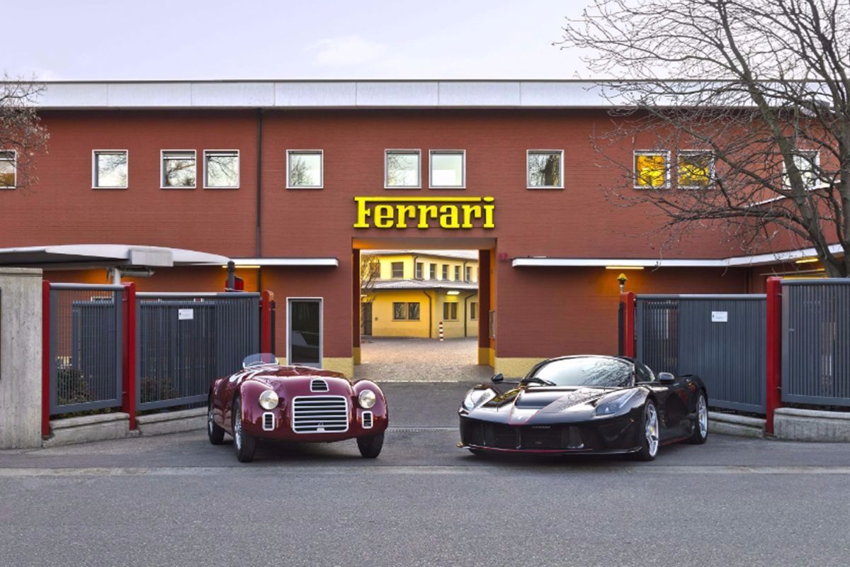 Ferraris in front of the Ferrari factory.