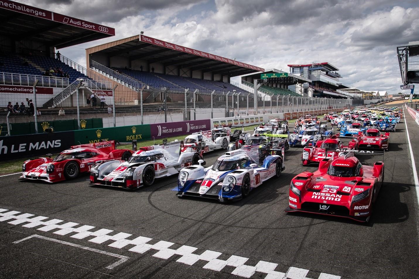 A lot of racing cars at Le Mans.