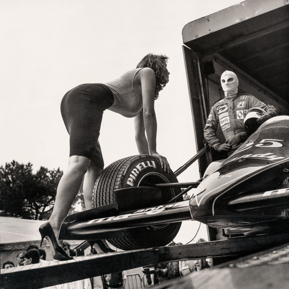 A girl on a tyre. From the Pirelli calendar.