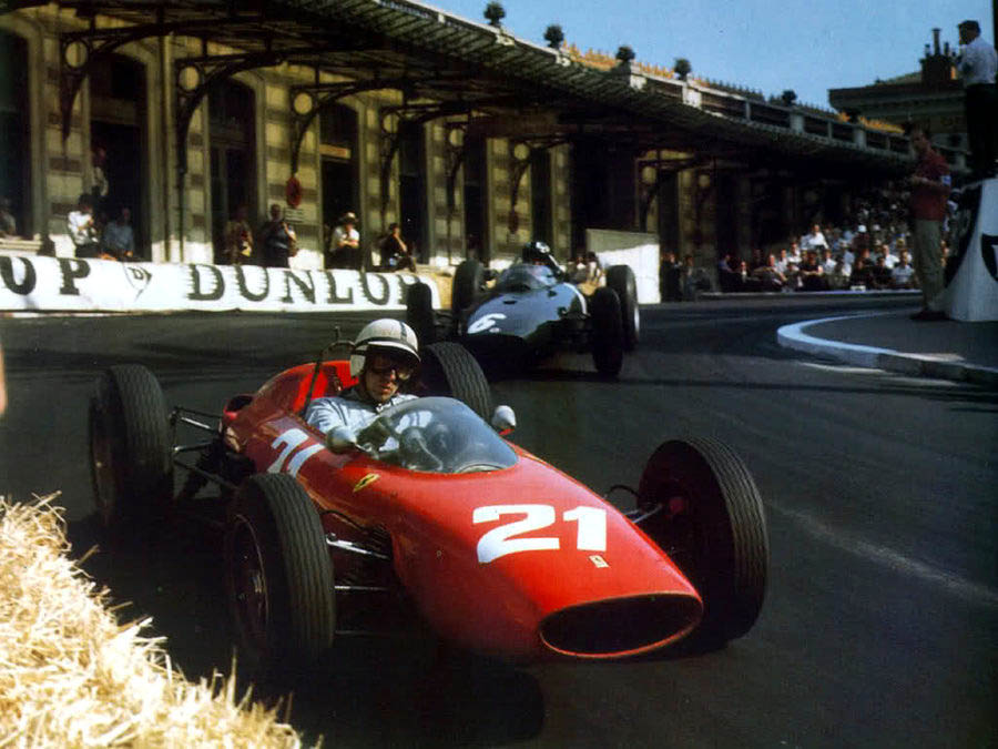 Graham Hill, BRM, chasing John Surtees, Ferrari, at Monaco in 1963.
