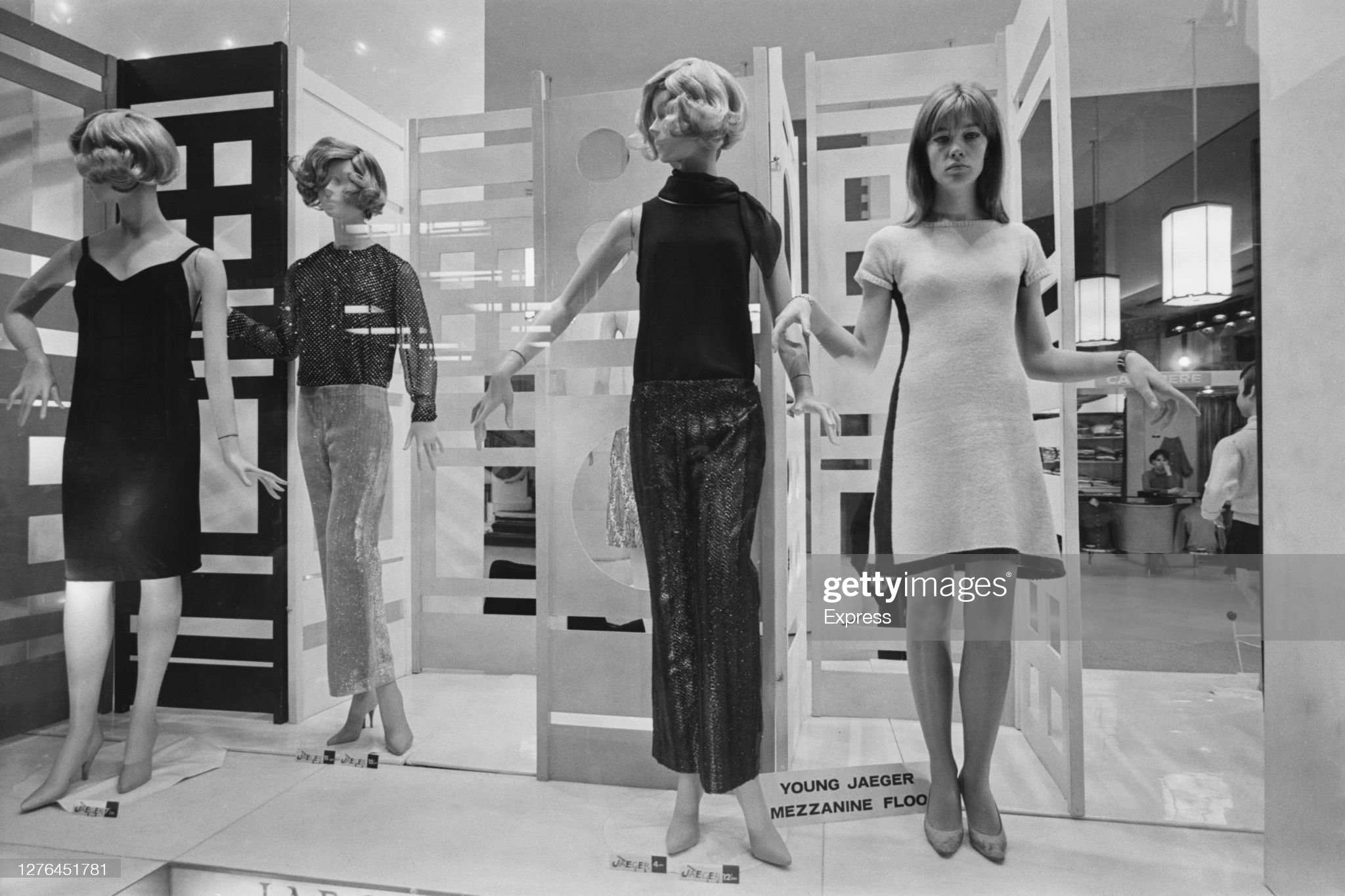French singer and songwriter Françoise Hardy poses with the mannequins in a store on Regent Street, London, in October 1965. 