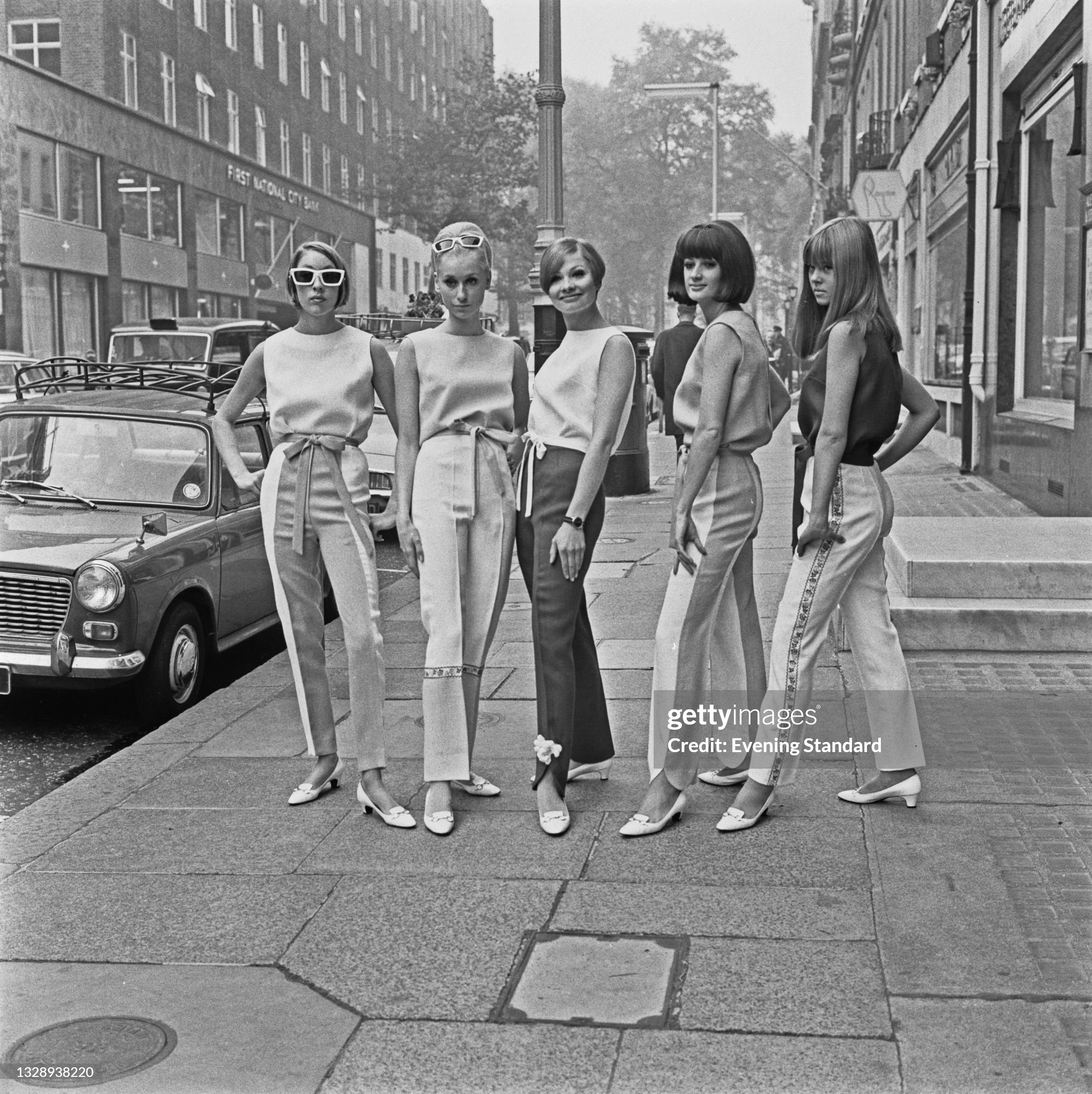 Models Judi Gomme, Joy Booth, Zoe Walker, Rocky Sandys and Jeannie Denyer in fashionable trousers, UK, 27th October 1965. 