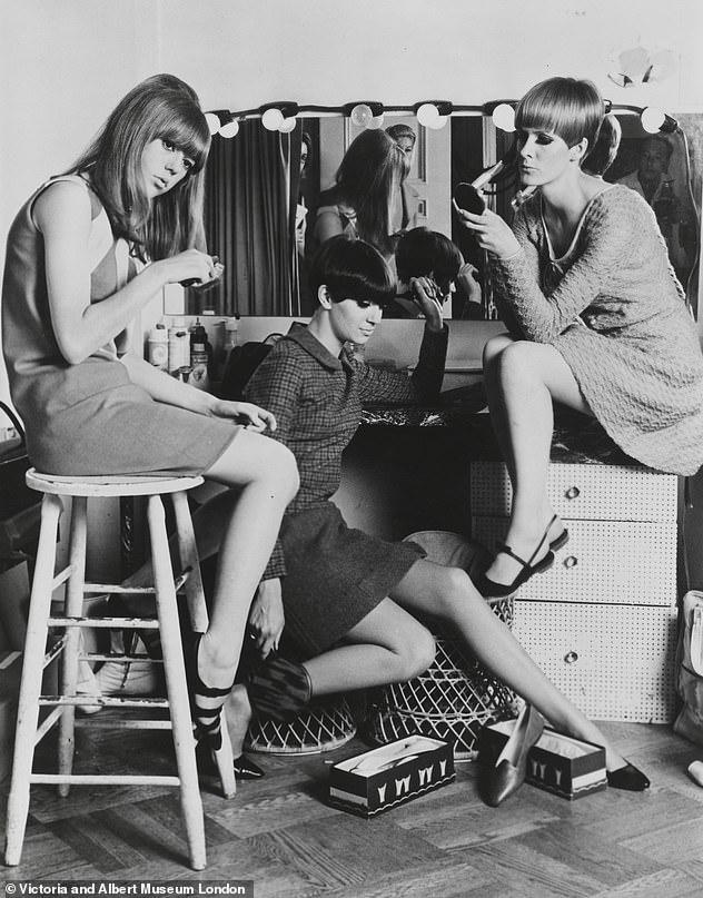 Models Jenny Boyd, Sandy Moss and Sarah Dawson in the backstage before a show in 1966.
