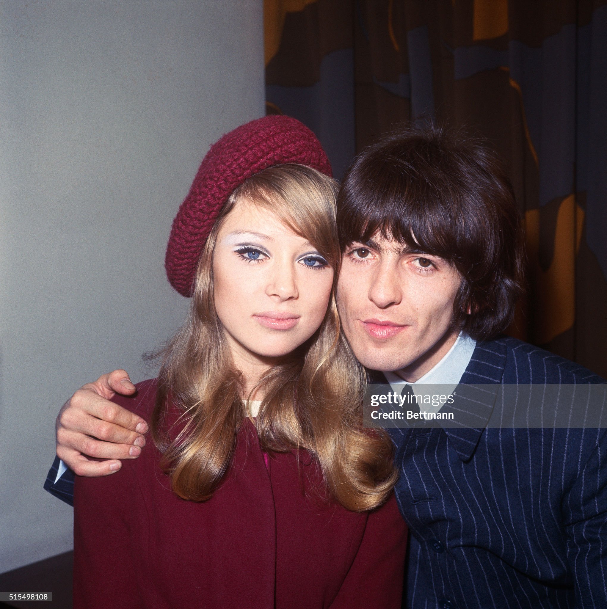 January 21, 1966. George Harrison, 22, hugs his bride, model Patti Boyd, 21, after they were married at the register office in Epsom. 